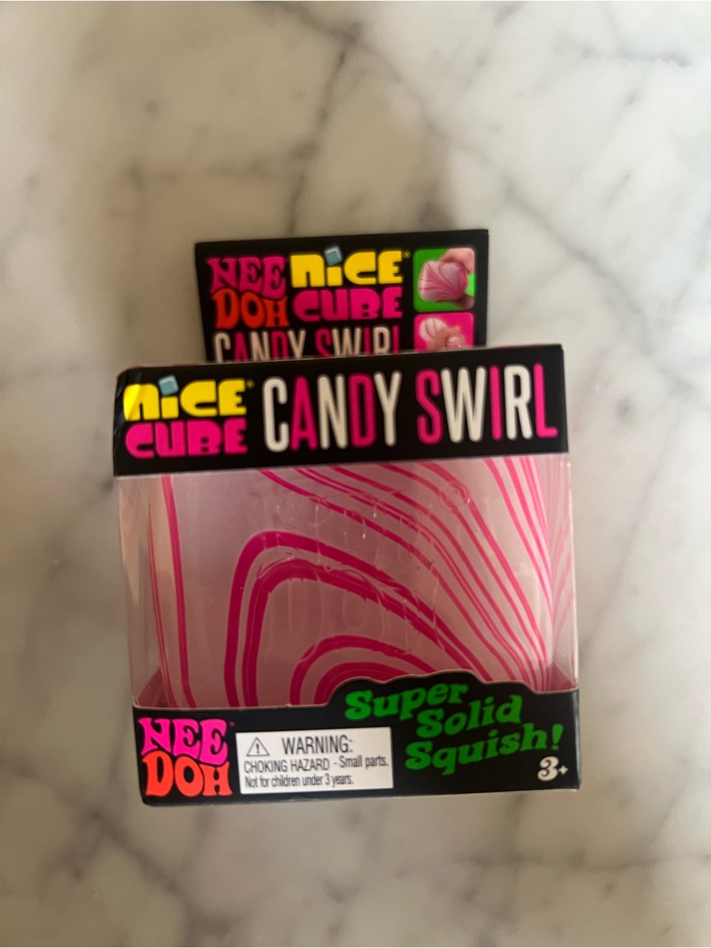 Nee doh Nice Cube Candy Swirl Pink Super Solid Squish Toy
